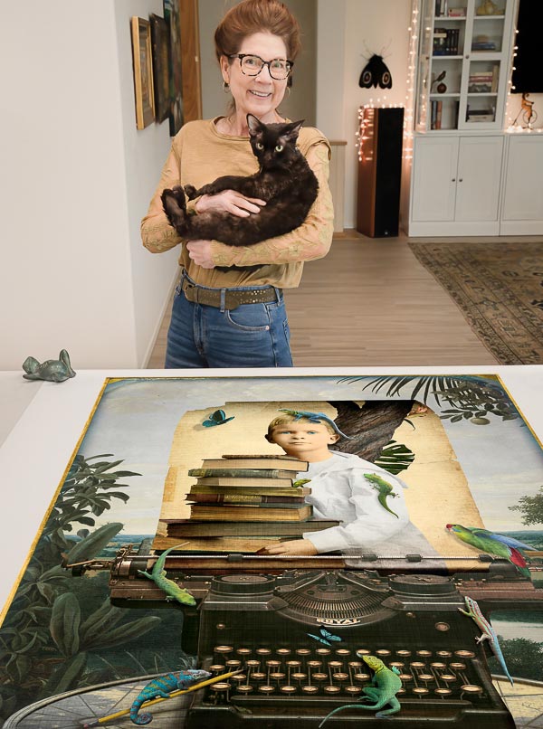 Corinne Geertsen holding cat with Museum size print